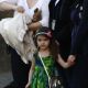 Super cute Suri Cruise stands by on the set of Tom Cruise’s ‘Knight and Day,’ Seville, Spain, December 11, 2009