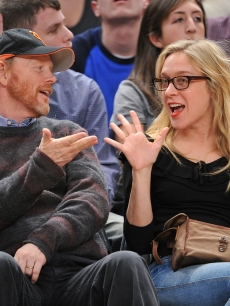 Ron Howard and Chloe Sevigny attend the San Antonio Spurs vs New York Knicks game at Madison Square Garden on December 27, 2009