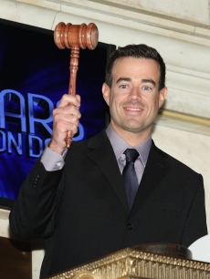 Carson Daly rings the closing bell at the New York Stock Exchange on December 30, 2009