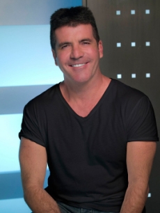 Simon Cowell poses for his ‘American Idol’ Season 9 cast shot, 2010