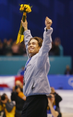 Apolo Anton Ohno of the USA celebrates before receiving the silver medal in the men’s 1000m speed skating during the Salt Lake City Winter Olympic Games at the Salt Lake Ice Center in Salt Lake City, Utah, Feb. 16, 2002