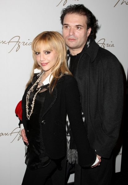 Brittany Murphy and husband Simon Monjack get close backstage at the Max Azaria show at Bryant Park during Mercedes-Benz Fashion Week in NYC on February 4, 2008
