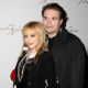 Brittany Murphy and husband Simon Monjack get close backstage at the Max Azaria show at Bryant Park during Mercedes-Benz Fashion Week in NYC on February 4, 2008