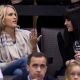 Carrie Underwood shows her new engagement ring as she watches her fiance, Mike Fisher of the Ottawa Senators, and his teammates take on Boston Bruins during the first period of an NHL hockey game in Ottawa on Monday, December 21, 2009