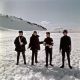 The Beatles: John Lennon, Paul McCartney, Ringo Starr and George Harrison pose for a photo in the snow in March 1965 in Obertauern, Austria during a break from filming their second movie, ‘Help,’ March 1965