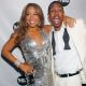 Mariah Carey and Nick Cannon pose for photos inside a New Year’s Eve celebration at M2 Ultra Lounge on December 31, 2009 in New York City