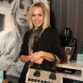 Jennie Garth looks fabulous with a bag from Guess by Marciano at Access Hollywood’s 4th Annual ‘Stuff You Must…' Golden Globes Gifting Lounge at the Sofitel Hotel in LA on January 15, 2010