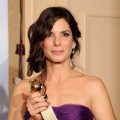 Sandra Bullock poses with her award for Best Actress - Drama backstage at the 67th Annual Golden Globe Awards at the Beverly Hilton Hotel in Beverly Hills, Calif., on January 17, 2010