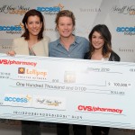 Kate Walsh and Shenae Grimes present the CVS Pharmacy donation to Access Hollywood’s Billy Bush and the Lollipop Theater Network at Access’ 4th Annual ‘Stuff You Must…' Golden Globes Gifting Lounge at the Sofitel Hotel in LA on January 16, 2010