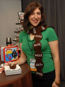 ‘Blossom’ star Mayim Bialik poses with a Hostess Cupcakes Nostalgic Lunchbox at Access Hollywood’s 4th Annual ‘Stuff You Must…' Golden Globes Gifting Lounge at the Sofitel Hotel in LA on January 15, 2010