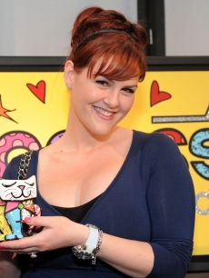 Sara Rue smiles with Romero Britto sculptures at Access Hollywood’s 4th Annual ‘Stuff You Must…' Golden Globes Gifting Lounge at the Sofitel Hotel in LA on January 16, 2010