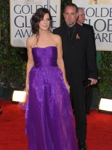 Sandra Bullock and Jesse James arrive at the 67th Annual Golden Globe Awards held at The Beverly Hilton Hotel on January 17, 2010 in Beverly Hills