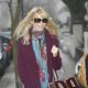 Claudia Schiffer, who is expecting her third child, smiles as she steps out in London, Jan. 18, 2010