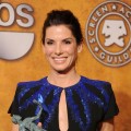 Sandra Bullock smiles with her award for Outstanding Female Actor in a Leading Role for ‘The Blind Side’ at the 16th Annual Screen Actors Guild Awards at the Shrine Auditorium in LA on January 23, 2010