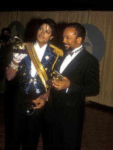 Michael Jackson and Quincy Jones pose at the 26th Annual Grammy Awards in Los Angeles, Calif., February 28, 1984
