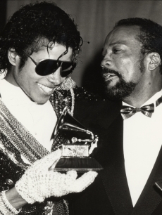 Michael Jackson and Quincy Jones pose at the 26th Annual Grammy Awards in Los Angeles, Calif., February 28, 1984 