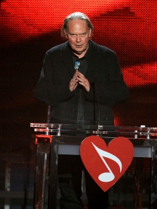 Neil Young takes the stage at the 2010 MusiCares Person of the Year Tribute to himself in LA on January 29, 2010