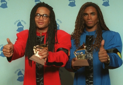 Rob Pilatus and Fab Morvan of Milli Vanilli pose with their Grammys after being presented with the 1989 Best New Artist award in Los Angeles, Calif., February 21, 1990
