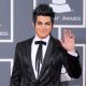 Adam Lambert waves hello at the 52nd Annual Grammy Awards at Staples Center in LA on January 31, 2010