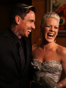 Carey Hart and Pink share a laugh backstage at the Grammys, Los Angeles, January 31, 2010