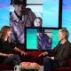 Ellen Pompeo shows off a picture of daughter Stella Luna and proud papa Chris Ivery on ‘The Ellen DeGeneres Show,’ February 2010