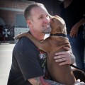 Jesse James smiles with his returned dog, Cinnabun, in Long Beach, Calif., on February 17, 2010
