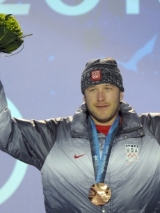 Bode Miller celebrates his bronze medal after the Men’s Alpine skiing downhill event of the Vancouver 2010 Winter Olympics