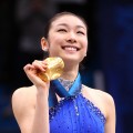 Kim Yu-Na of South Korea celebrates winning the gold medal in the Ladies Free Skating during the medal ceremony on day 14 of the 2010 Vancouver Winter Olympics at Pacific Coliseum on February 25, 2010