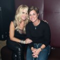 Kim Zolciak and DJ Tracy Young pose at Splash Bar in New York City on December 10, 2009