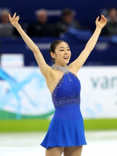Kim Yu-Na of South Korea reacts after her skate in the Ladies Free Skating on day 14 of the 2010 Vancouver Winter Olympics at Pacific Coliseum on February 25, 2010 in Vancouver, Canada