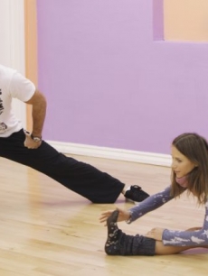 Aiden Turner and Edyta Sliwinska stretch out at a rehearsal for ‘Dancing with the Stars’ Season 10