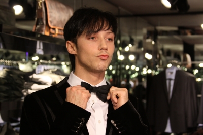 Johnny Weir fixes his bow tie with Access Hollywood in LA on March 4, 2010