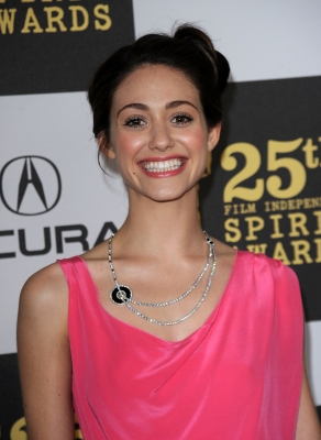 Emmy Rossum shows her smile on the blue carpet at the 25th Film Independent Spirit Awards in LA on March 5, 2010
