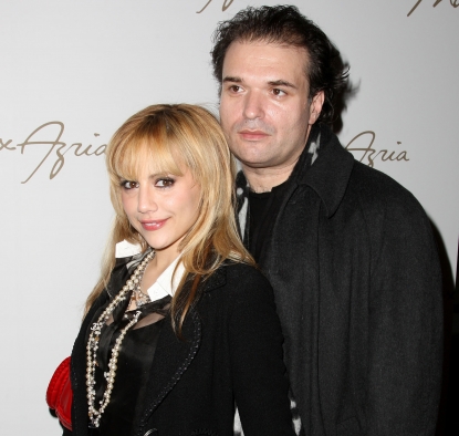 Brittany Murphy and husband Simon Monjack get close backstage at the Max Azaria show at Bryant Park during Mercedes-Benz Fashion Week in NYC on February 4, 2008