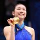 Kim Yu-Na of South Korea celebrates winning the gold medal in the Ladies Free Skating during the medal ceremony on day 14 of the 2010 Vancouver Winter Olympics at Pacific Coliseum on February 25, 2010