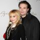 Brittany Murphy and husband Simon Monjack get close backstage at the Max Azaria show at Bryant Park during Mercedes-Benz Fashion Week in NYC on February 4, 2008