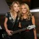 Taylor Swift and Carrie Underwood pose backstage during the 44th annual Academy Of Country Music Awards held at the MGM Grand in Las Vegas, Nevada on April 5, 2009 