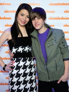 Miranda Cosgrove and Justin Bieber attend the Nickelodeon 2010 Upfront Presentation at Hammerstein Ballroom, NYC, March 11, 2010