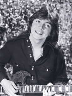 David Cassidy holds his guitar, 1970