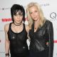 Joan Jett and Cherie Currie of the rock group The Runaways attend the premiere of ‘The Runaways’ at the Landmark Sunshine Cinema in New York City on March 17, 2010