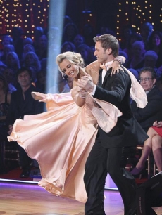 Former ‘Bachelor’ star Jake Pavelka and partner Chelsie Hightower romance the crowd with a Viennese Waltz to Seal’s ‘Kiss from a Rose’ during the Season 10 premiere of ‘Dancing with the Stars’ on March 22, 2010