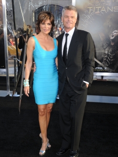 Lisa Rinna and Harry Hamlin arrive to the premiere of Warner Bros. ‘Clash Of The Titans’ held at Grauman’s Chinese Theatre on March 31, 2010 in Los Angeles, California.