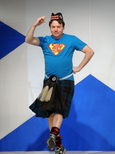 Mike Myers dances his way down the runway at the 8th annual ‘Dressed To Kilt’ Charity Fashion Show presented by Glenfiddich at M2 Ultra Lounge in New York City on April 5, 2010 