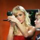 Paris Hilton checks her make-up onstage during Fuse TV’s Daily Download with the cast of ‘House of Wax’ at Fuse Studios on May 4, 2005 in New York City