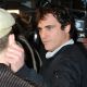 Joaquin Phoenix arrives at Banksy’s ‘Exit Through The Gift Shop’ premiere at the Los Angeles Theater on April 12, 2010