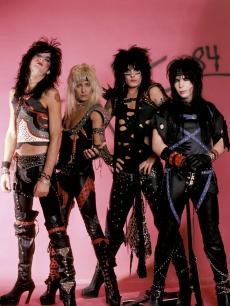 Hair metal kings Motley Crue — Tommy Lee, Vince Neil, Nikki Sixx and Mick Mars pose for a shot, Jan. 1984