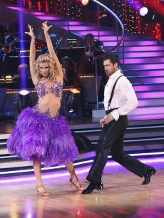 Erin Andrews ruffles her feathers to the samba with partner Maksim Cherkovskiy on ‘Dancing with the Stars’ Season 10, Week 6 on April 26, 2010