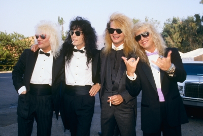 Poison — Bret Michaels, C.C. DeVille, Rikki Rockett and Bobby Dall — pose on the red carpet at the 1987 MTV Music Video Awards in Los Angeles