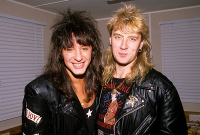 Richie Sambora of Bon Jovi poses for a pic with fellow hair metal god Joe Elliot of Def Leppard, Jan. 12, 1989