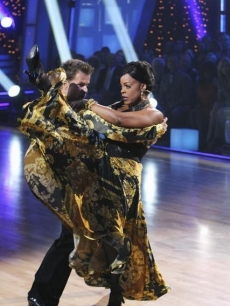 Niecy Nash kicks up a leg during an ‘90s-inspired paso doble with partner Louis Van Amstel on ‘Dancing with the Stars’ Season 10, Week 8 on May 10, 2010